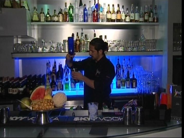 Ilias Contreas working behind a cocktail bar
